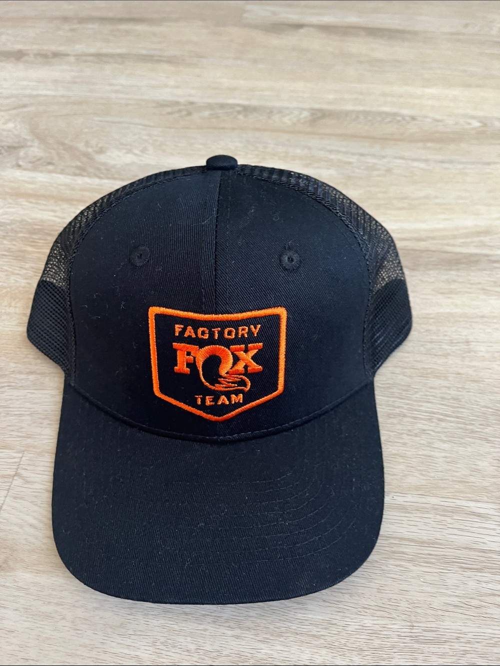 Fox Black Trucker Hat with Orange Patch